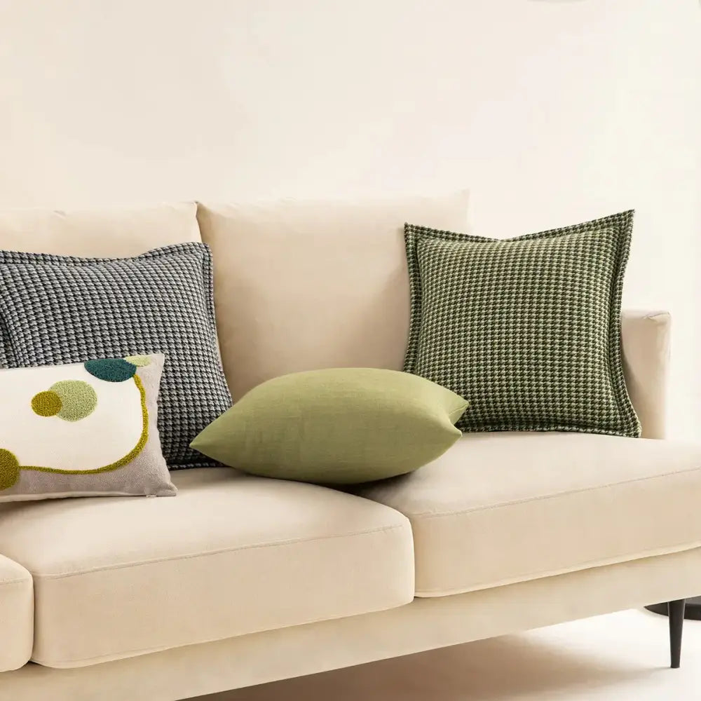 Beige velvet sofa with green and dark gray pillow covers and olive cream decorbites houndstooth jacquard cushion covers