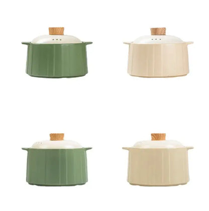 Set of four olive green and white ceramic casserole pots with fluted sides and wooden knobs for gas stove rice use