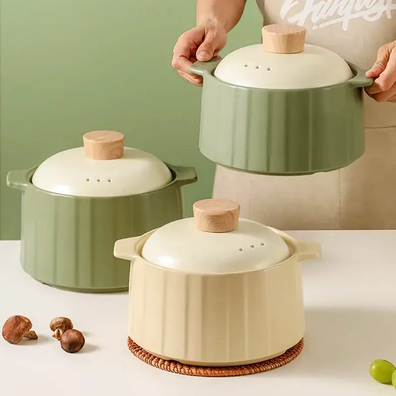 Muted green and cream ceramic casserole pot with wooden lids for decorbites gas stove rice cooking use