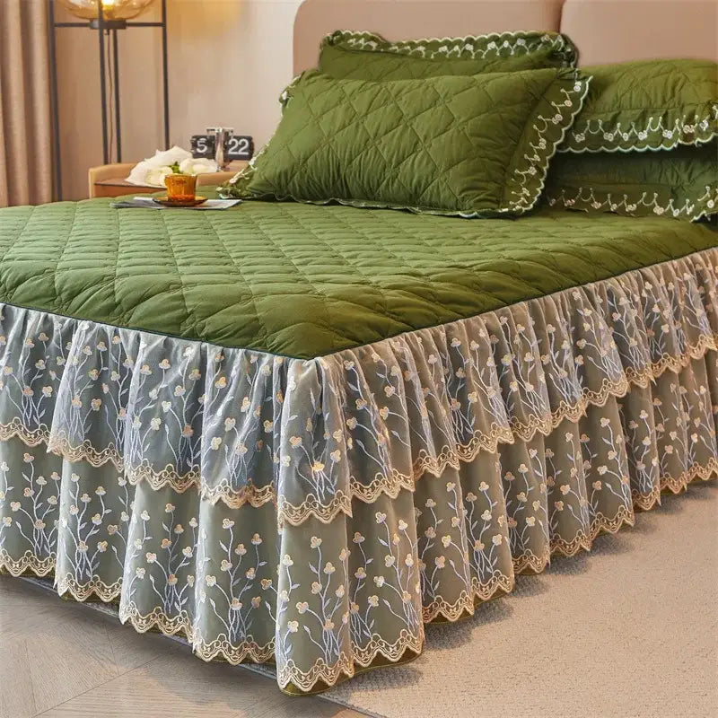 Olive green quilted bed skirt set with layered ruffles and cream beige floral embroidery and white lace trim