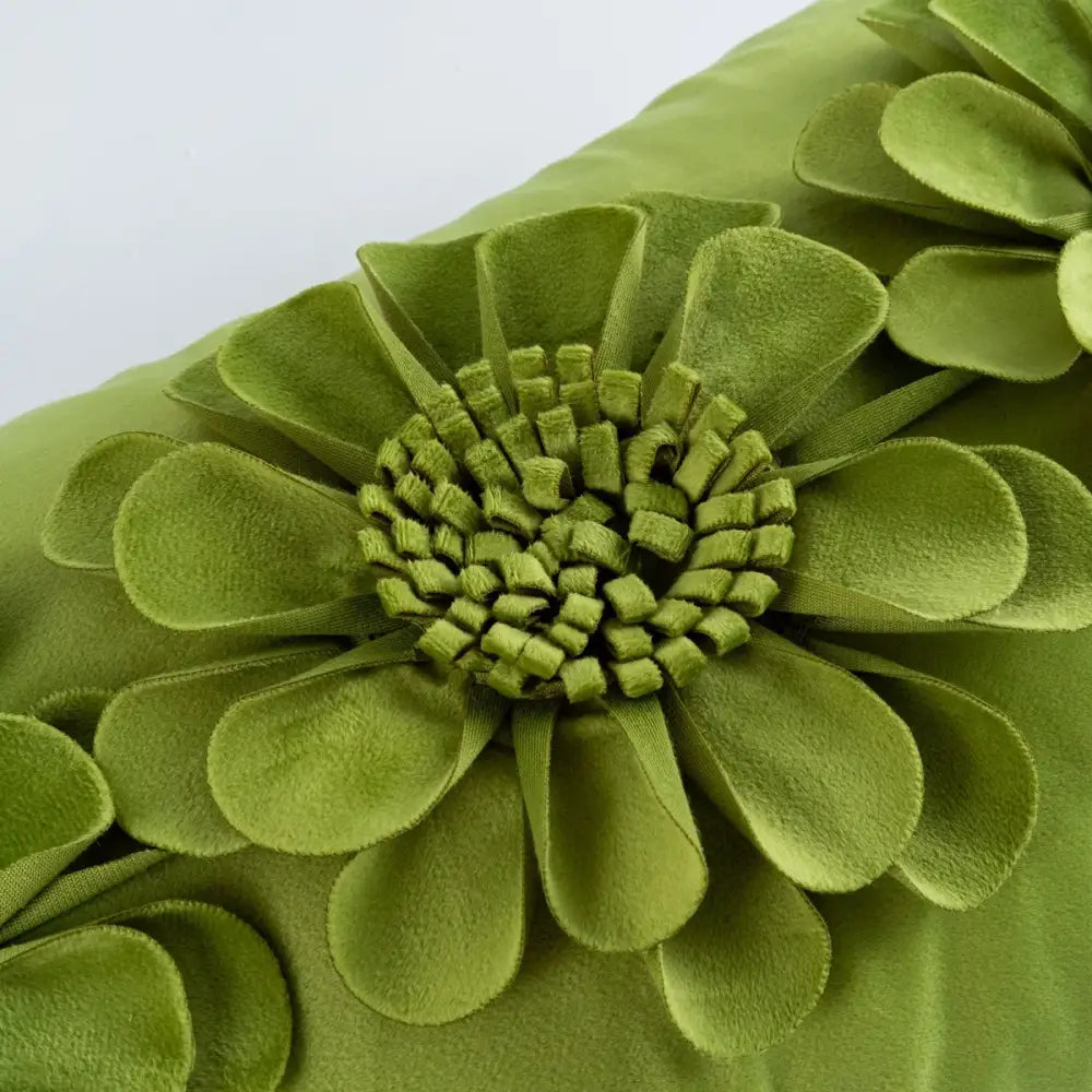 A plush olive green velvet decorbites handmade flower cushion cover with layered petals and textured center for living room decor