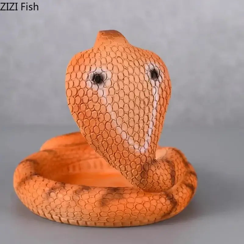 Orange cobra ashtray resin figurine with textured scales and black eye details for decorbites cobra ashtray office decor
