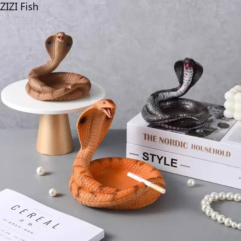 Orange cobra ashtray resin craft with textured scales and hollow interior ideal for office decor by decorbites cobra ashtray