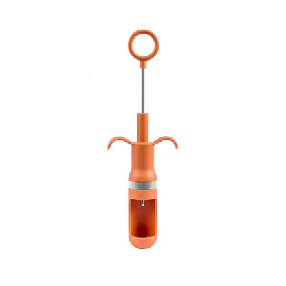 Orange plastic apple corer with metal stem and ring handle designed as a cherry pitter fruit core remover tool