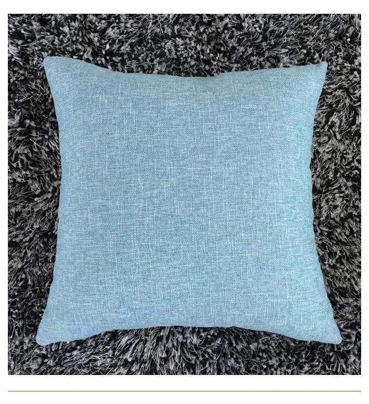 Light blue linen-textured cushion cover complementing decorbites ivory sofa cushion for living room decor