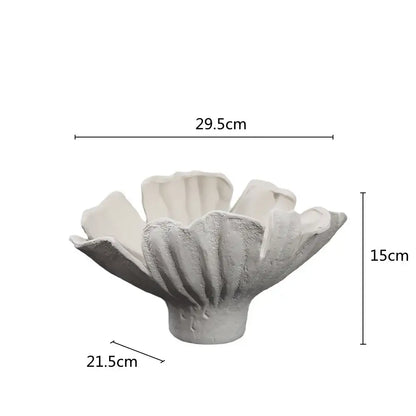 Off-white textured ceramic wavy flower vase with sculpted petals and fluted base for decorbites living room decor