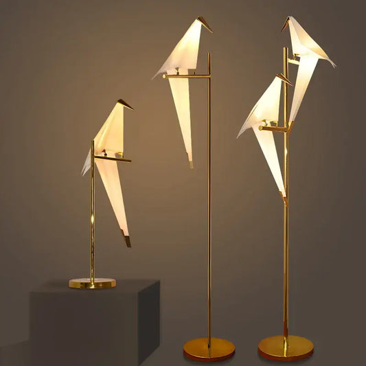 Origami gold bird led floor lamp with illuminated white paper wings in gold finish for elegant living room decorbites bird led floor