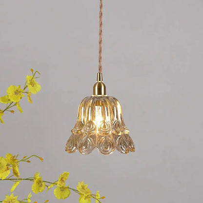 Ornate amber copper led pendant light with translucent fluted glass and brass accents for café and dining room use