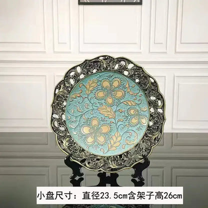 Ornate circular decorative plate with turquoise center and black metal filigree border for resin vase dried flowers decor