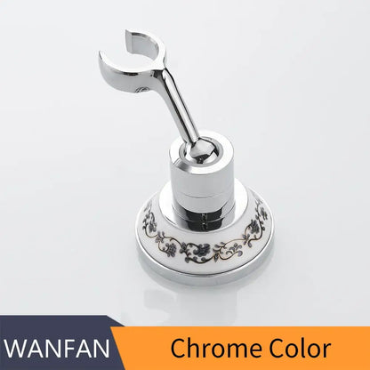 Chrome-finished bathroom towel rack with ornate floral pattern on circular base for handheld shower mount bracket use