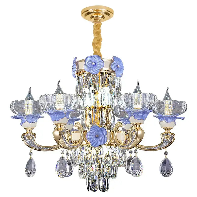 Elegant gold-toned decorbites crystal candle chandelier with clear crystal droplets and blue floral accents for staircase lighting