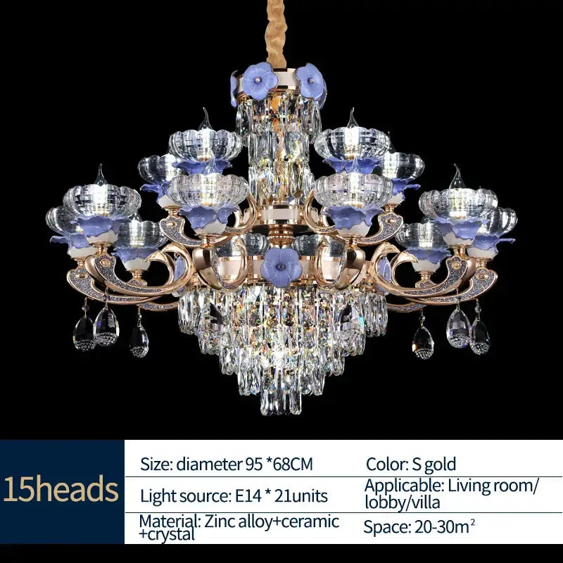 A luxurious gold-toned decorbites crystal candle chandelier with 15 flower-shaped lights and teardrop crystals for staircase lighting