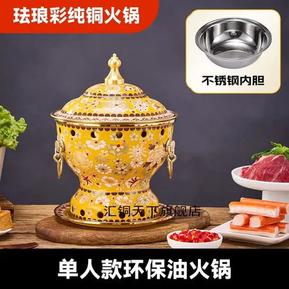 Ornate yellow enamel copper hot pot with floral patterns gold accents matching lid and decorative handles for kitchen cookware