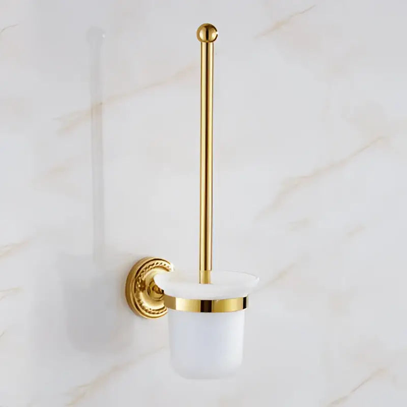 Gold-finished toilet brush holder with frosted ceramic base and decorative wall mount from decorbites brass gold bathroom set