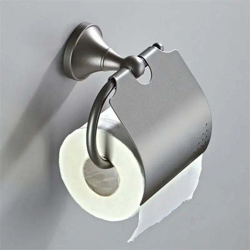 Brushed nickel toilet paper holder with perforated cover in ornate decorbites gray bathroom accessories set