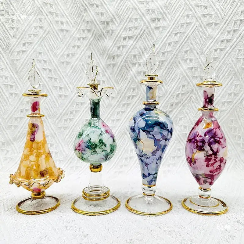 Ornate colorful glass bottle jewelry ornaments featuring gold-toned glass bottle accents and floral patterns for bedroom decor