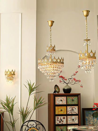 Ornate gold crown crystal led pendant light with intricate design and cascading crystal droplets for living room decorbites crystal led
