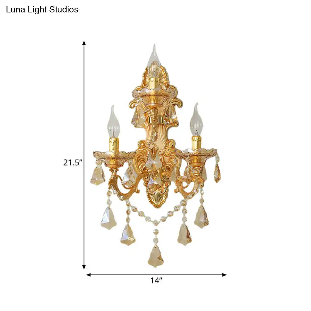 Ornate gold metal fixture living room sconce with crystal accents and dangling teardrop crystals inch fixture