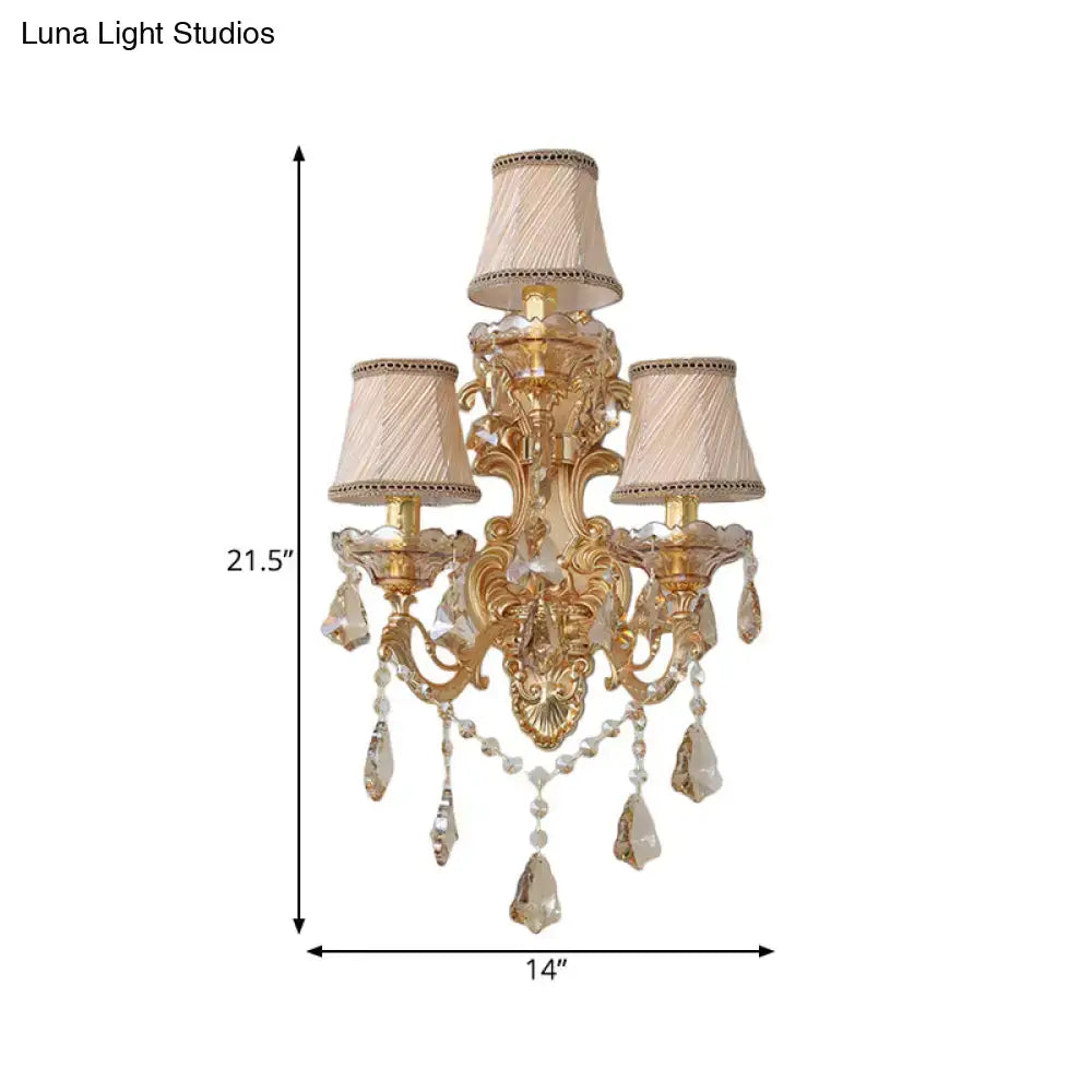 Ornate gold metal fixture living room sconce with three beige fabric shades and dangling crystal teardrop pendants inch fixture