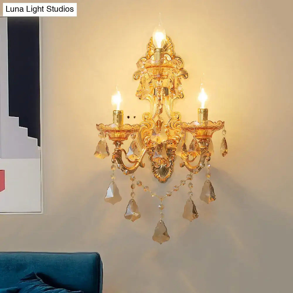 Ornate gold metal fixture living room sconce with three candle-style lights and dangling crystal droplets inch fixture