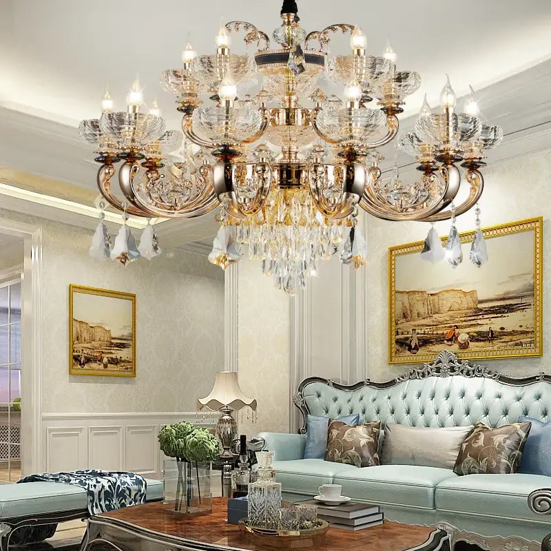 Ornate gold decorbites crystal candle chandelier with multi-tiered metalwork and clear crystals for dining room decor