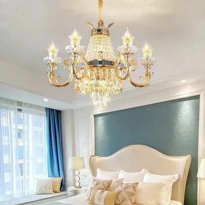 Ornate gold crystal dining room chandelier with green gemstone accents for elegant decorbites crystal dining decor
