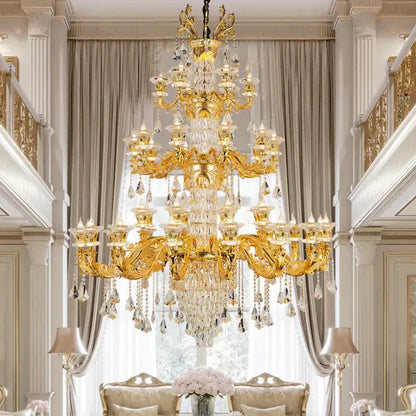 A grand ornate gold decorbites crystal chandelier with cascading clear crystal droplets for living room luxury