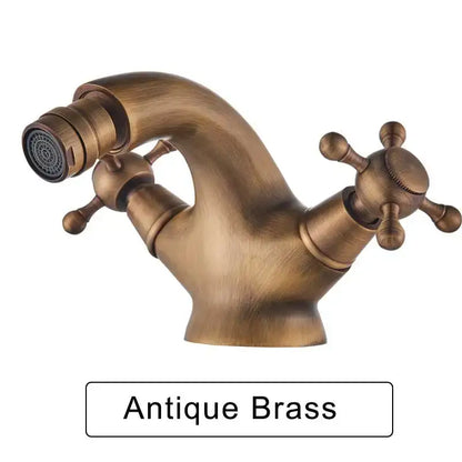 Antique brass ornate gold dual handle bidet faucet with curved spout and cross handles for bathroom vessel sink