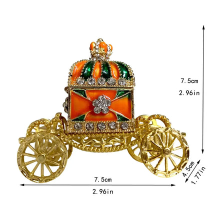 Ornate gold enamel crown jewelry box carriage brooch with orange, green accents, clear rhinestones, and jeweled crown top