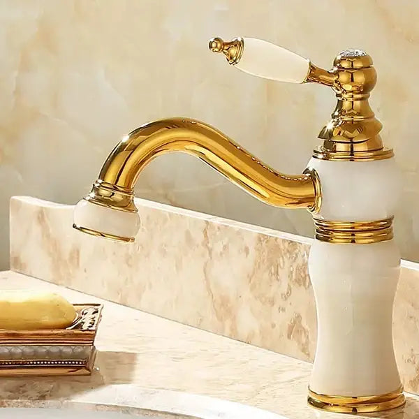 Ornate gold and white marble bathroom basin sink faucet with green jade accents for elegant jade bathroom basin use