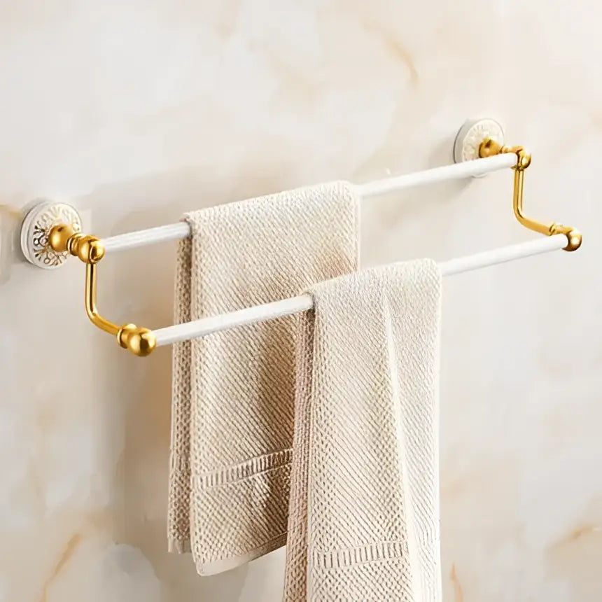 Ornate gold and white double towel rack with floral decorative ends from decorbites bathroom accessories set
