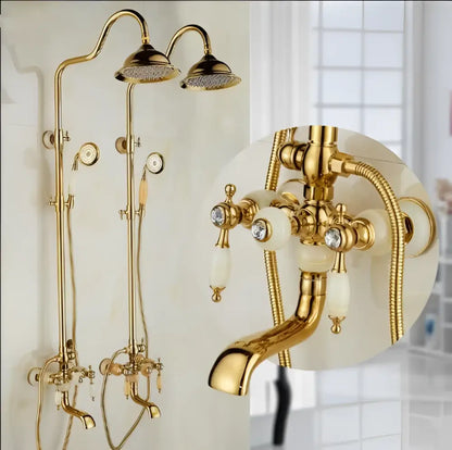 Ornate golden brass bath shower set with two overhead rainheads handheld spray and ceramic handles with crystal accents