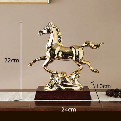Ornate golden horse mascot resin statue with polished metallic surface on decorative base for living room decor