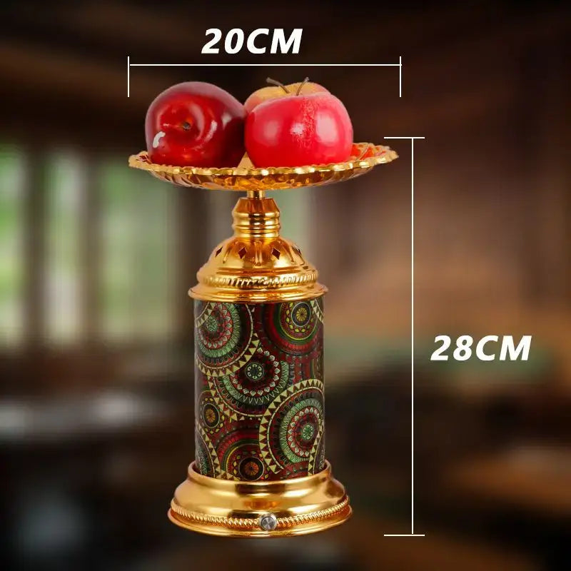 Golden mosaic decorbites fruit platter desk lamp with intricate green and red patterns holding shiny red apples