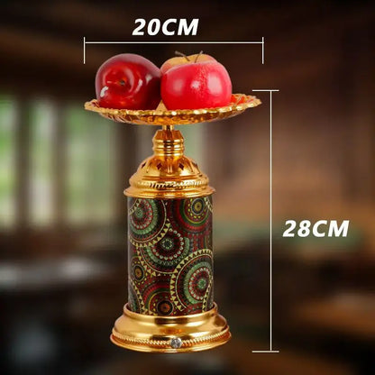 Golden mosaic decorbites fruit platter desk lamp with intricate green and red patterns holding shiny red apples