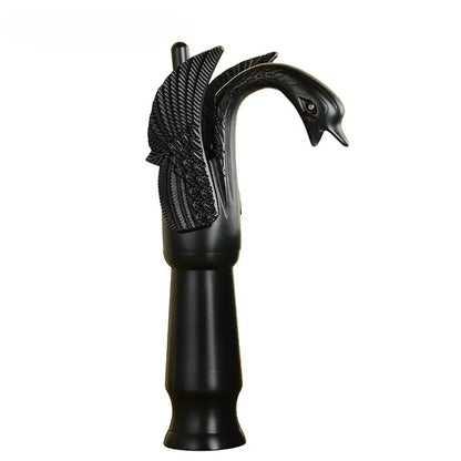 Ornate golden swan solid brass basin faucet with ceramic valve core and detailed black swan-shaped glossy wings