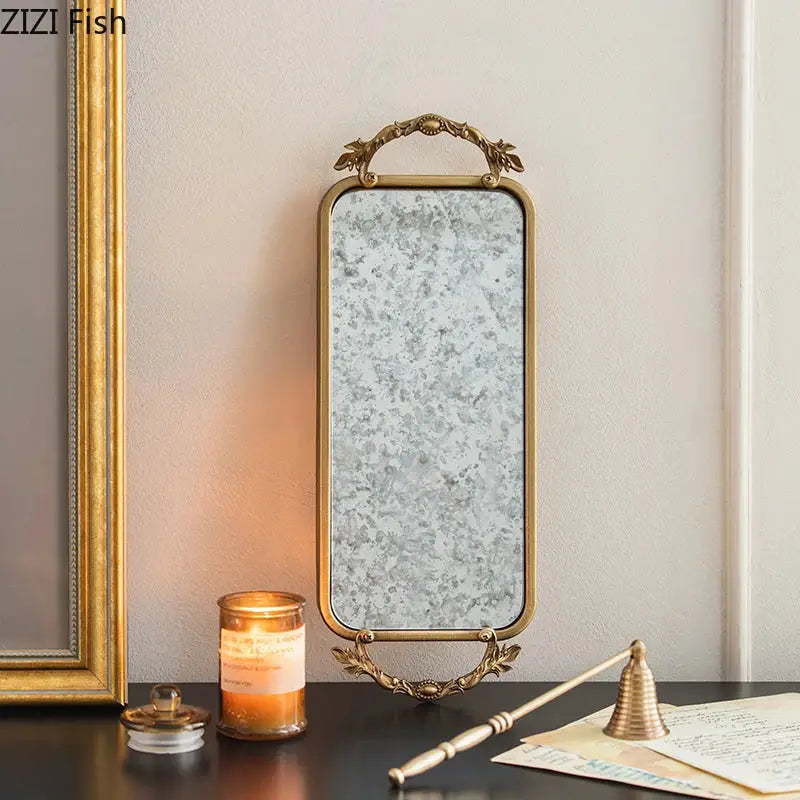 Antique-style decorbites golden mirror glass tray with ornate gold-toned metal frame and leafy scrollwork for bedroom decor