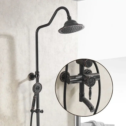 Ornate matte black brass shower faucet set with matching handheld sprayer for bathroom use