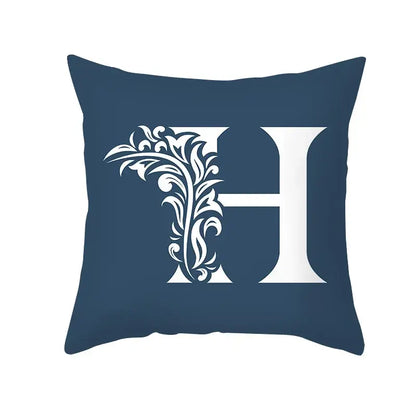 Navy blue throw pillow with white ornate letter h and floral details in decorbites blue letter pillowcase design