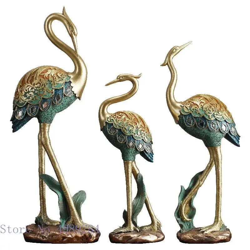 Ornate teal and gold crane bird sculpture with intricate engraved patterns for elegant living room decor by decorbites crane bird