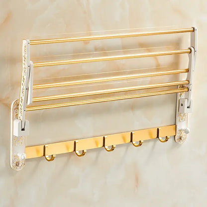 Gold-colored multi-tiered wall-mounted towel rack with ornate white side panels and hooks from decorbites bath hardware set