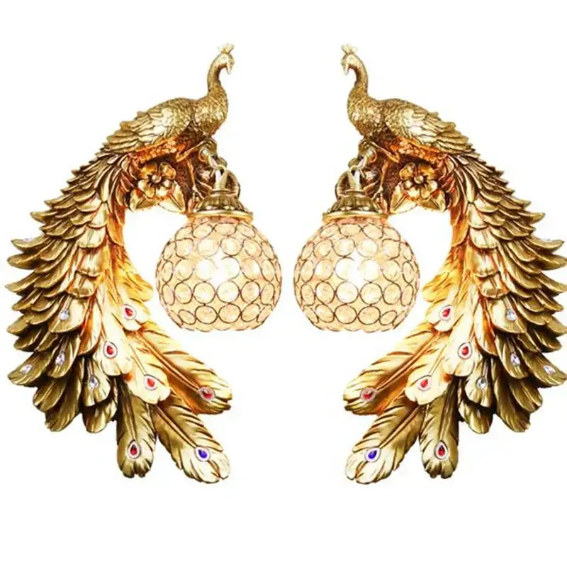 Ornate white gold peacock crystal wall lamp pair with intricate feather details and red and blue gemstones decorbites gold peacock