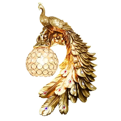 Ornate white gold peacock wall lamp with intricate feather details and embedded red and blue gold peacock crystal gems