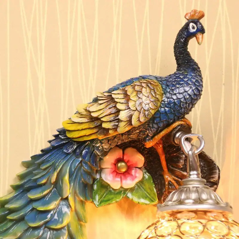 Ornate white gold peacock crystal wall lamp with vibrant blue and green feathers for elegant bedroom decorbites gold peacock