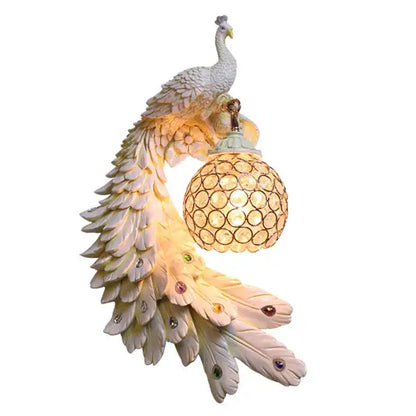 Ornate white gold peacock crystal wall lamp decorbites gold peacock with iridescent feathers and golden spherical shade