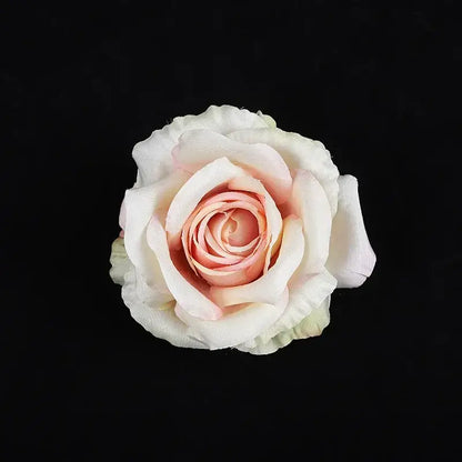 A delicate blush pink and white silk rose with soft layered petals from pastel 30pcs silk roses wedding decor