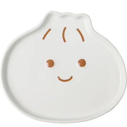White ceramic dumpling shaped plate with brown facial features from decorbites cloud tulip cartoon dog tableware collection