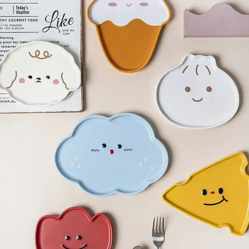 Pastel blue ceramic cloud tulip cartoon dog plate with smiling face and raindrop details for decorbites cloud tulip dining