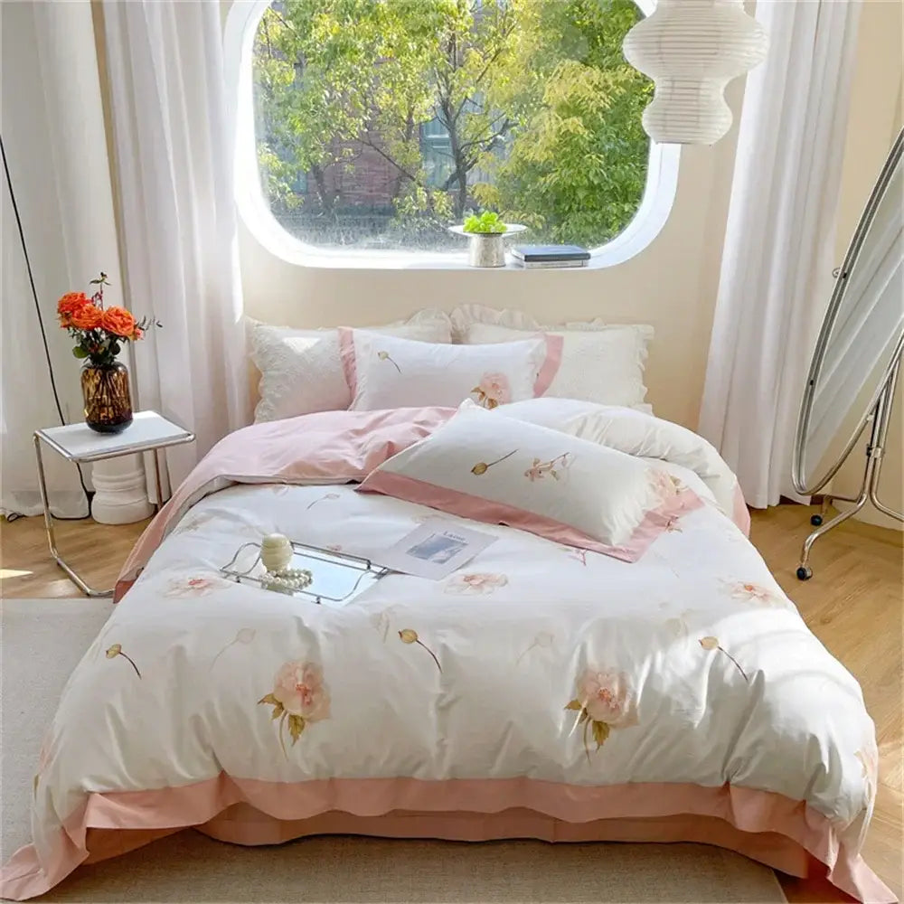 Pastel blue and peach floral bedding set with pink and white ruffled edges designed for decorbites colorful bedding decor