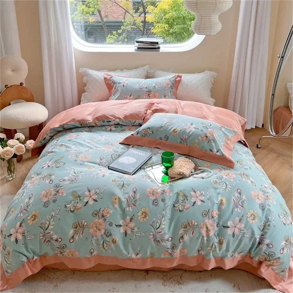 Pastel blue and peach floral bedding set with ruffled trim and matching pillowcases from decorbites colorful bedding collection